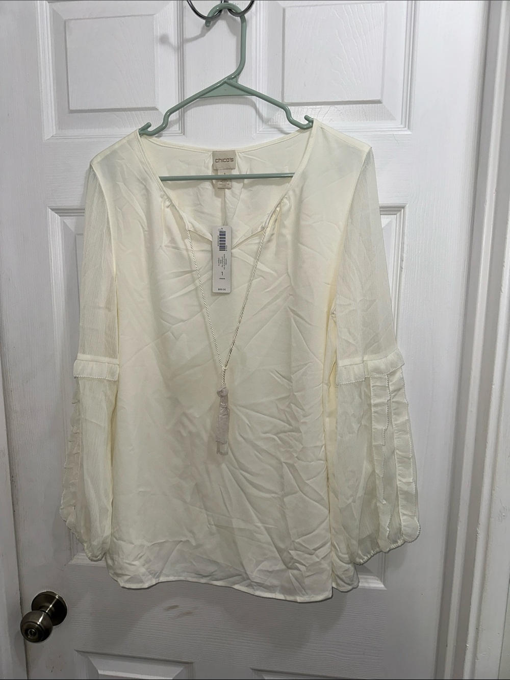 Chico's Ivory V-Neck Blouse with front tassel ties tiered ruffles on sleeves